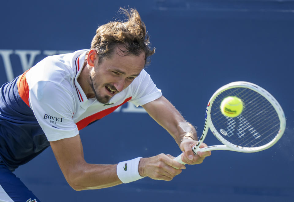 Daniil Medvedev, of Russia, reaches for a shot from Lorenzo Musetti, of Italy, during the National Bank Open men’s tennis tournament Thursday, Aug. 10, 2023, in Toronto. (Frank Gunn/The Canadian Press via AP)