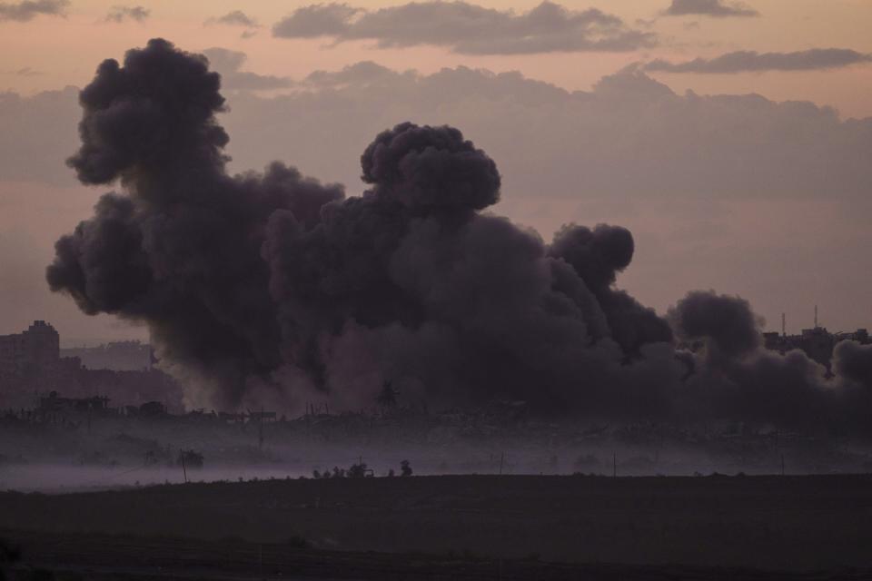 Smoke rises following an Israeli airstrike in the Gaza Strip, as seen from southern Israel, Tuesday, Nov. 21, 2023. (AP Photo/Leo Correa)