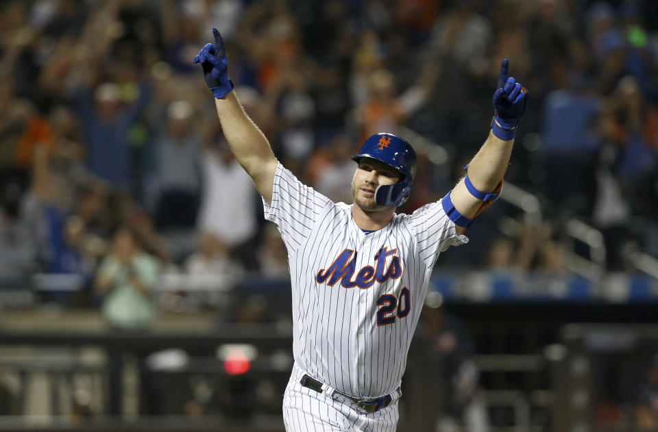 NEW YORK, NEW YORK - SEPTEMBER 28:   Pete Alonso #20 of the New York Mets celebrates his third inning home run against the Atlanta Braves at Citi Field on September 28, 2019 in New York City. The Mets defeated the Braves 3-0.  The home run was Alonso's 53rd of the season setting a new rookie record.  (Photo by Jim McIsaac/Getty Images)