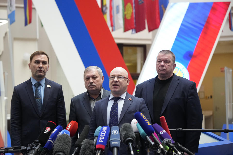 The presidential nominee of the Communists of Russia Party, Sergei Malinkovich, centre, speaks to journalists after a meeting of the Russia's Central Election Commission in Moscow, Russia, Thursday, Feb. 8, 2024. (AP Photo/Alexander Zemlianichenko)