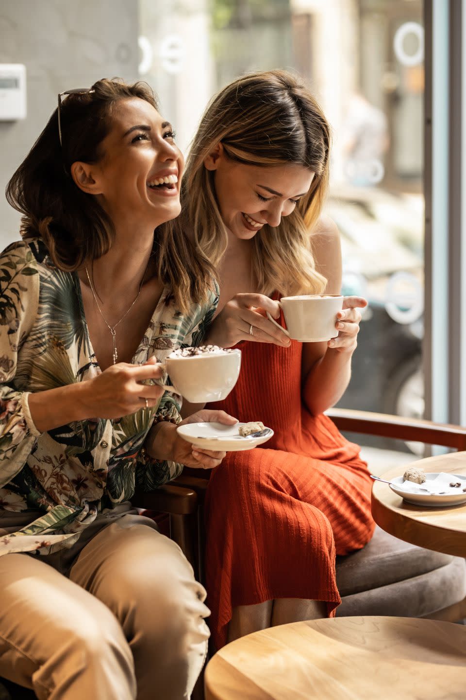 friends laughing over coffee