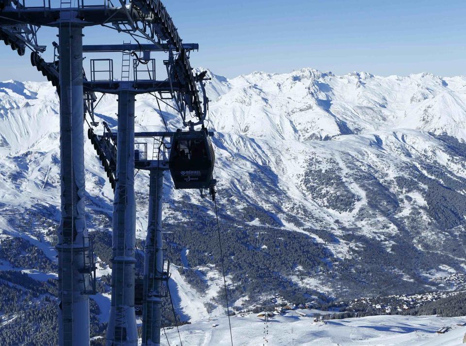 A gondola arrives at Saulire mountain in Meribel