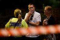 <p>People react as police attend to an incident near London Bridge in London, Britain, June 4, 2017. (Hannah McKay/Reuters) </p>