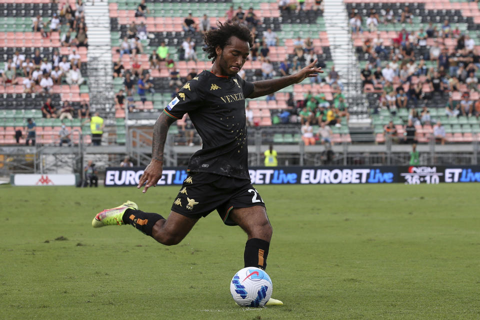 Venezia's Gianluca Busio kicks the ball during the Serie A soccer match between Venezia and Spezia, at the Pier Luigi Penzo stadium in Venice, Italy, Sunday, Sept. 19, 2021. Italian soccer team Venezia is back in the top division for the first time since 2002. And it has tapped Major League Soccer to recruit young Americans in its bid to stay afloat in Serie A. Nineteen-year-old Gianluca Busio arrived in Venice from Sporting Kansas City and 20-year-old Tanner Tessmann from FC Dallas. (Paola Garbuio/LaPresse via AP)