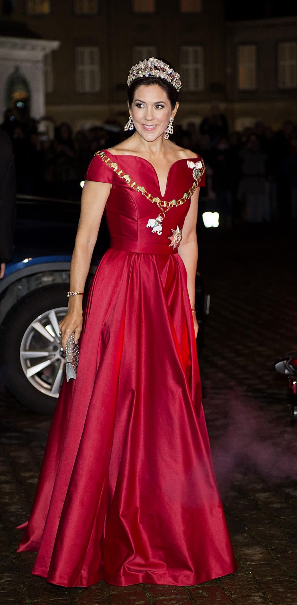 Princess Mary has stunned in a red gown at a Danish New Year's Eve party. Photo: Australscope