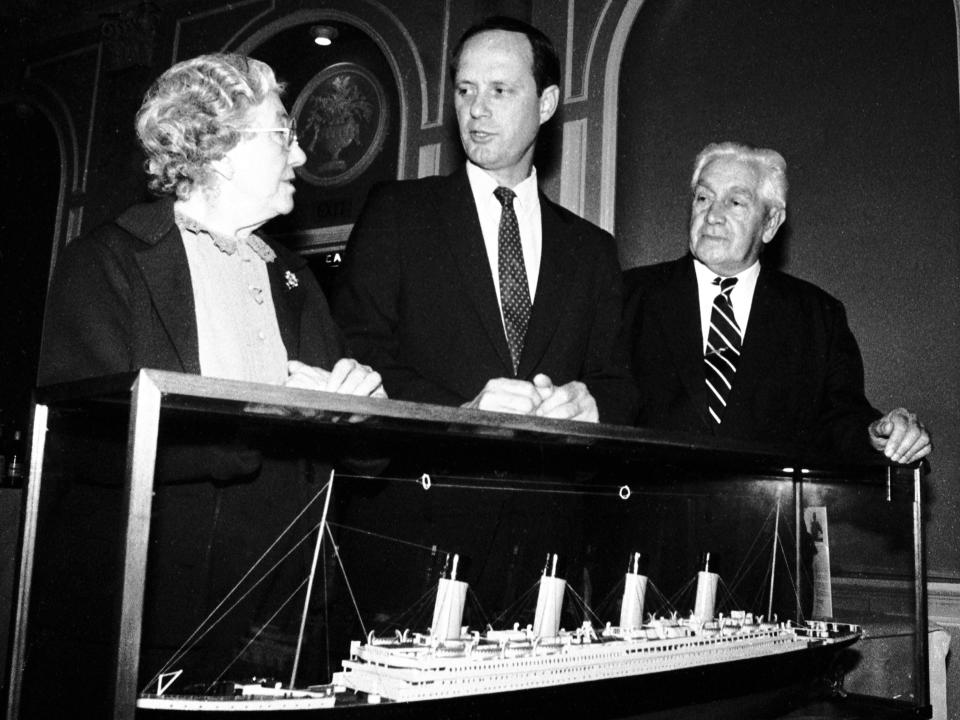 American scientist Dr Robert Ballard (centre), who led last year's deep sea expedition to film the wreck of the Titanic, in London for tomorrow's publication of his book 'The Discovery of the Titanic'. With him are two British survivors Eva Hart, 82, of Chadwell Heath, Essex, and Bertram Dean, of Southampton. They are standing next to a model of the liner, which sank off Newfoundland on her maiden voyage in 1912.