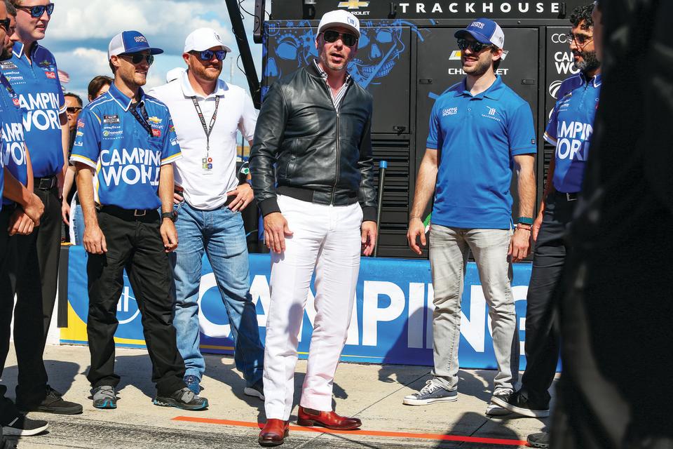 nascar cup series coca cola 600 and singer pitbull talking with the team