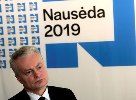 FILE PHOTO: Lithuanian presidential candidate Gitanas Nauseda speaks to media in Vilnius, Lithuania May 4, 2019. REUTERS/Ints Kalnins