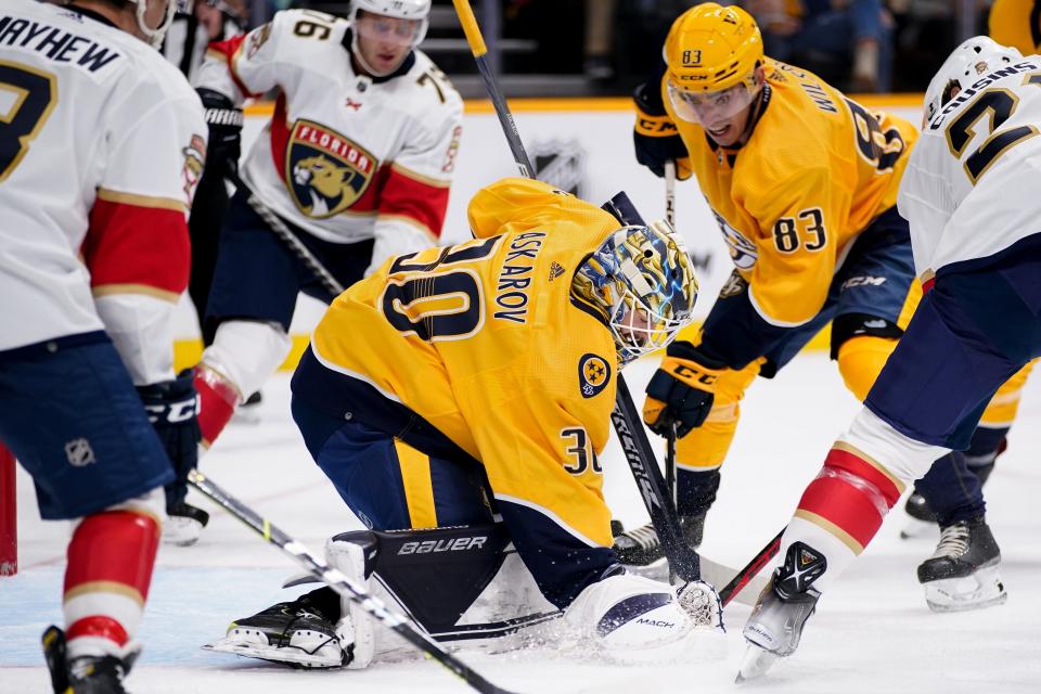 Nashville Predators goaltender Yaroslav Askarov (30) stops a Florida Panthers shot during the second period of the second game in a pre-season doubleheader at Bridgestone Arena in Nashville, Tenn., Monday, Sept. 26, 2022.