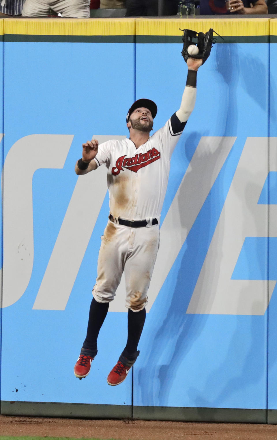 Cleveland Indians' Tyler Naquin catches a ball hit by Boston Red Sox's J.D. Martinez on the eighth inning of a baseball game, Monday, Aug. 12, 2019, in Cleveland. Martinez was out on the play. (AP Photo/Tony Dejak)