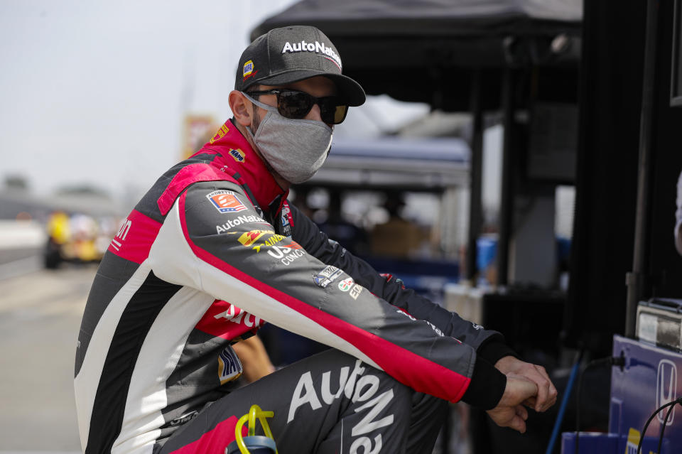 FILE - Race driver Alexander Rossi waits for the start of practice for the IndyCar auto race at Indianapolis Motor Speedway in Indianapolis, in this Friday, July 3, 2020, file photo. Alexander Rossi doesn't mince words about last season, when Andretti Autosport won just one race as an organization. "I just think we sucked globally," he said of the effort. (AP Photo/Darron Cummings, File)