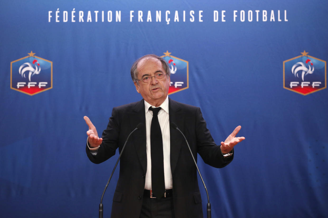 French Football Federation of soccer (FFF) President Noel Le Graet reacts during a news conference at the FFF headquarters in Paris, France, December 10, 2015. Real Madrid striker Karim Benzema has been suspended indefinitely from the France team because of the blackmail case he is embroiled in, the president of the national soccer federation (FFF) said on Thursday.  REUTERS/Charles Platiau