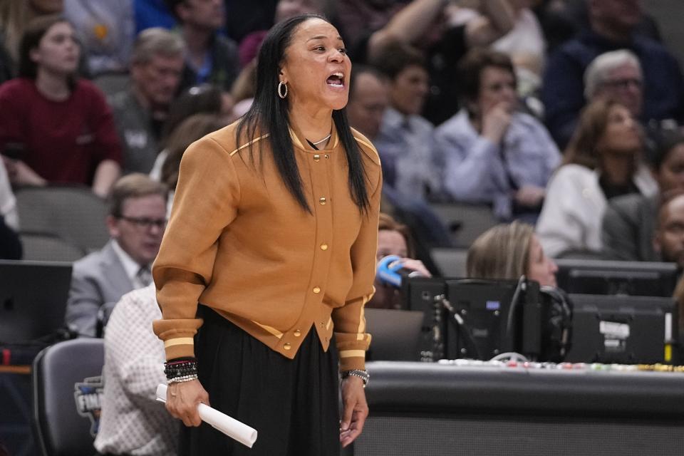 South Carolina head coach Dawn Staley reacts during the first half of an NCAA Women's Final Four semifinals basketball game against Iowa Friday, March 31, 2023, in Dallas. (AP Photo/Darron Cummings)