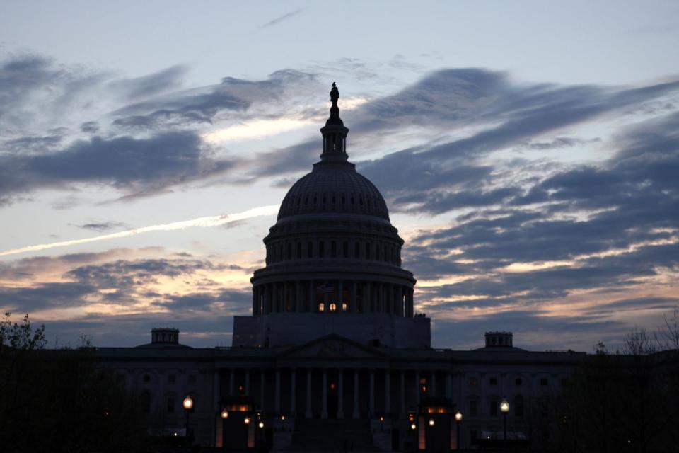 FILE - In this March 25, 2012, file photo, the U.S. Capitol is seen on the eve of the Supreme Court arguments on President Obama's health care legislation, in Washington. A new poll finds that Americans overwhelmingly want the president and Congress to get to work on a new bill to change the health care system if the Supreme Court strikes down President Barack Obama’s 2010 law as unconstitutional. That doesn’t seem to be in either party’s plans on the verge of the high court’s verdict on the law that was aimed at extending health insurance to more than 30 million Americans who now lack coverage. (AP Photo/Jacquelyn Martin, File)