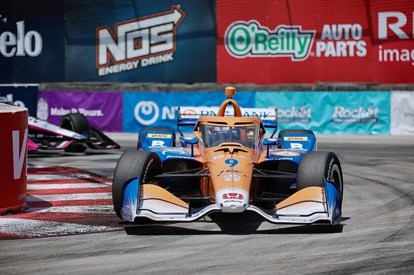 Scott Dixon races ahead of the field en route to winning the Grand Prix of Long Beach.