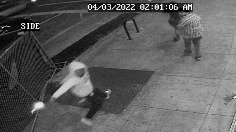 A surveillance video obtained by the Sacramento Police Department shows Mtula Payton firing his weapon as he flees on 10th Street after a gun battle at 10th and K streets April 3, 2022, in downtown Sacramento. Six people were killed and 12 others were wounded in the shootout. Prosecutors on Tuesday charged three men with the murders of three women killed in the gunfight.