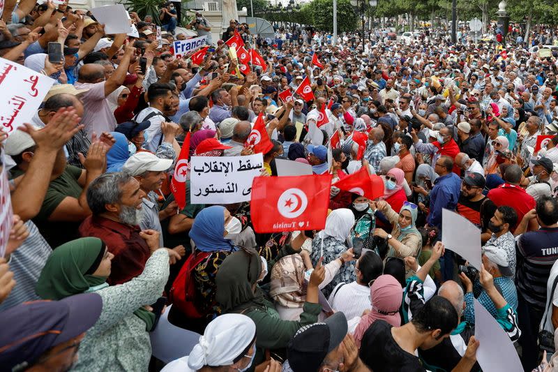 Opponents of Tunisia's President Kais Saied protest against what they call his coup on July 25, in Tunis