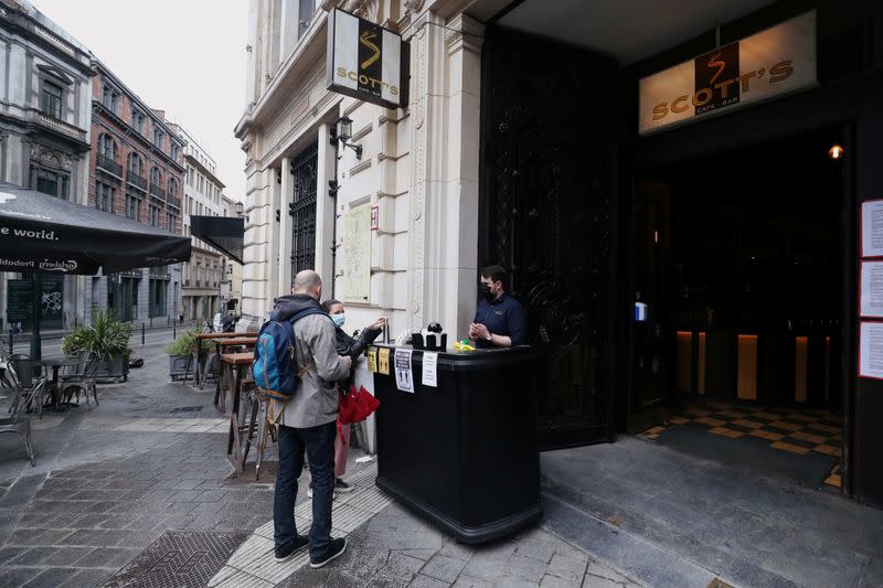 PJ, owner the Brussels bar Scott's Cafe Bar, is seen during the reopening after weeks of lockdown restrictions amid the coronavirus disease (COVID-19) outbreak, in Brussels