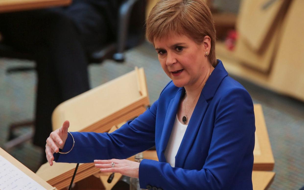 Nicola Sturgeon has come under fire over her government's guidance on transferring hospital patients into care homes - PA