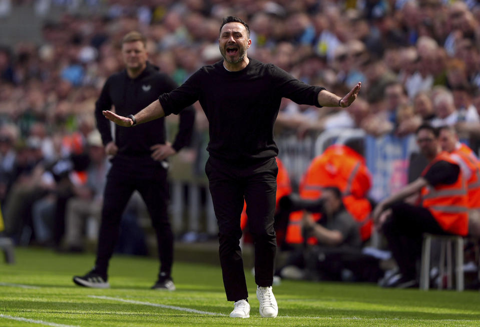 Brighton's manager Roberto De Zerbi gestures, during the English Premier League soccer match between Newcastle United and Brighton & Hove Albion, at St. James' Park, in Newcastle, England, Saturday May 11, 2024. (Owen Humphreys/PA via AP)
