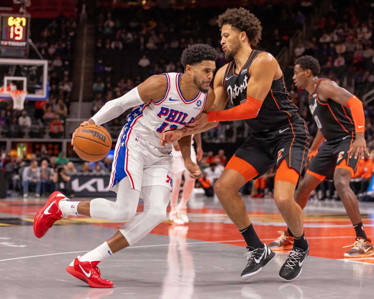 Pistons guard Cade Cunningham defends 76ers forward Tobias Harris in the first half on Friday, Nov. 10, 2023, at Little Caesars Arena.
