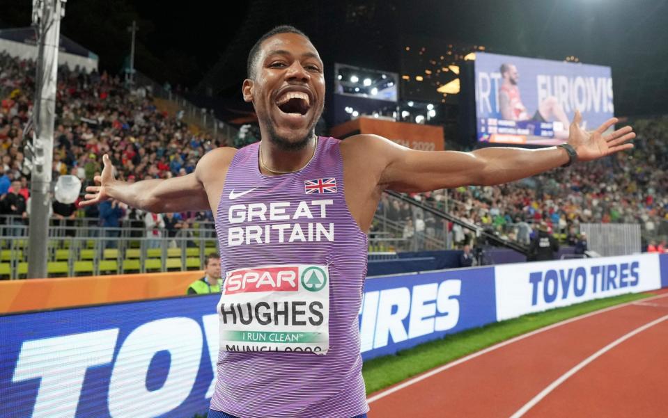 Zharnel Hughes, of Great Britain, celebrates after winning the gold medal in the Men's 200 meters during the athletics competition in the Olympic Stadium at the European Championships in Munich, Germany, Friday, Aug. 19, 2022 - AP