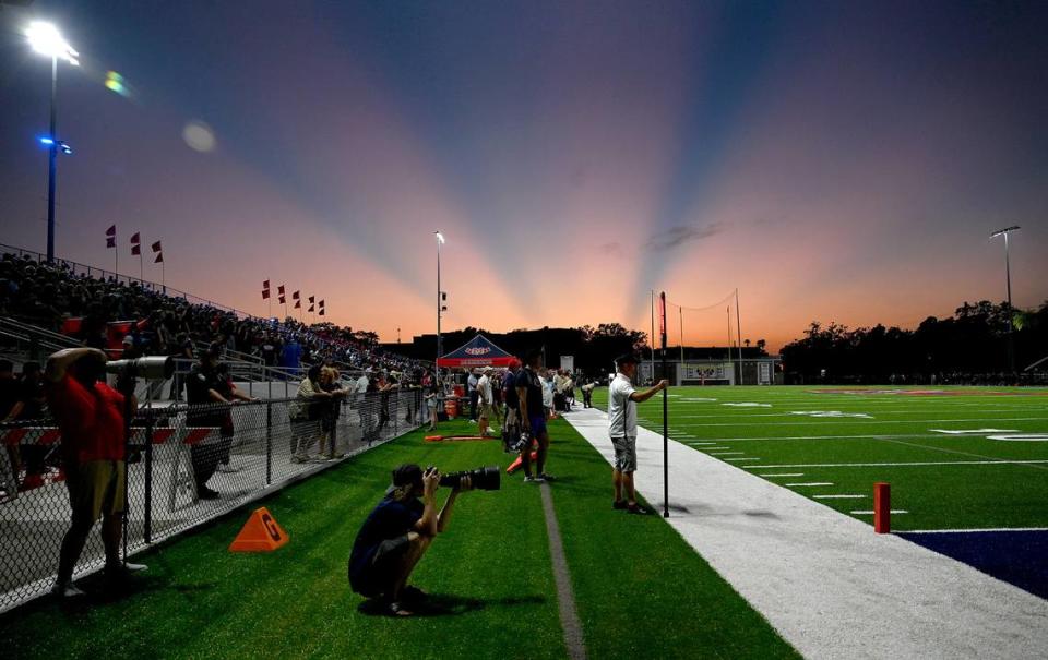 The sun sets Friday, Sept. 15, 2023, at Hawkins Stadium.