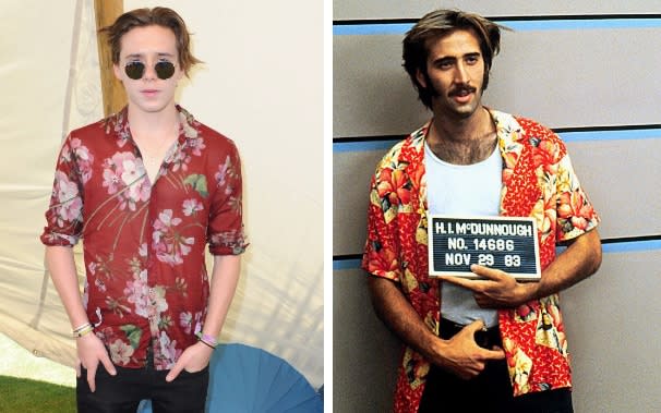 Brooklyn Beckham and Nicolas Cage in Raising Arizona sporting red Hawaiian shirts - Joshua Blanchard/Alamy