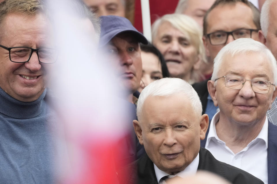 Leader of Poland's right-wing opposition party Law and Justice, Jaroslaw Kaczynski, front, attends the party's protest rally of a few thousand backers against the policies of Prime Minister Donald Tusk's Cabinet before the Ministry of Justice, in Warsaw, Poland, Saturday Sept. 14, 2024. (AP Photo/Czarek Sokolowski)