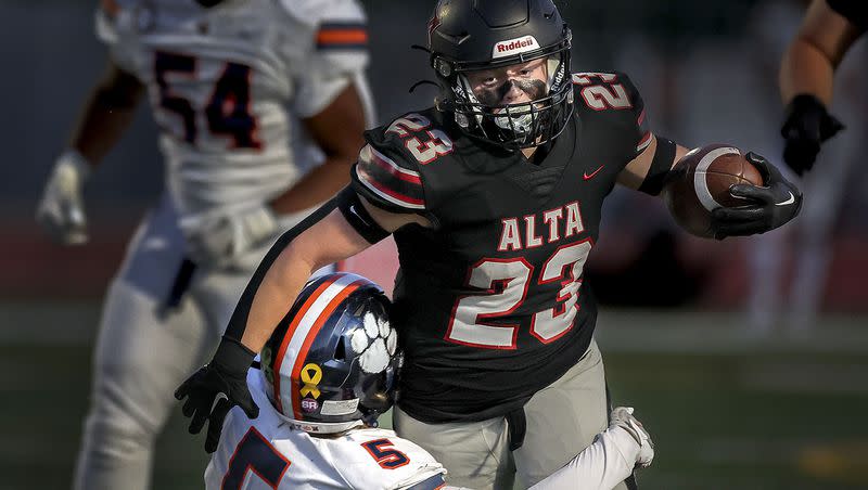 Alta’s Nolan Lohnes drives past Brighton’s Miles Morgan as Brighton High School and Alta High School compete in a Week 8 football showdown at Alta High in Sandy on Friday, Sept. 29, 2023.