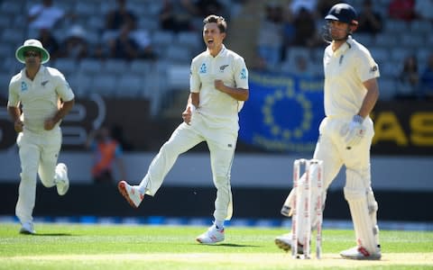 Trent Boult celebrates the wicket of Alastair Cook - Credit: GETTY IMAGES