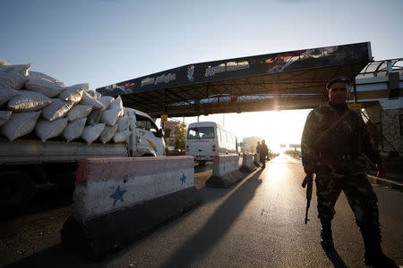 A Syrian soldier is seen at a check point in Damascus,Syria April 14,2018.REUTERS/ Omar Sanadiki