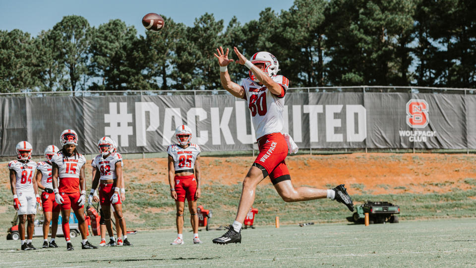 NC State receiver Bradley Rozner catches a pass during 2023 fall camp.