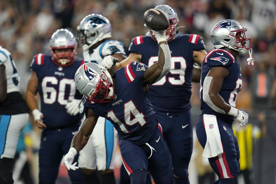 New England Patriots wide receiver Ty Montgomery (14) spikes the ball after scoring a touchdown during the first half of the team's preseason NFL football game against the Carolina Panthers, Friday, Aug. 19, 2022, in Foxborough, Mass. (AP Photo/Charles Krupa)