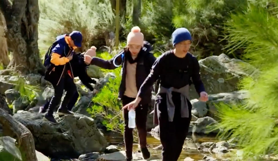 Parental Guidance 'Tiger parents' Kevin and Debbie and their son, Leo and daughter, Mimi walking near a creek in the bush. Photo: Channel Nine (supplied).