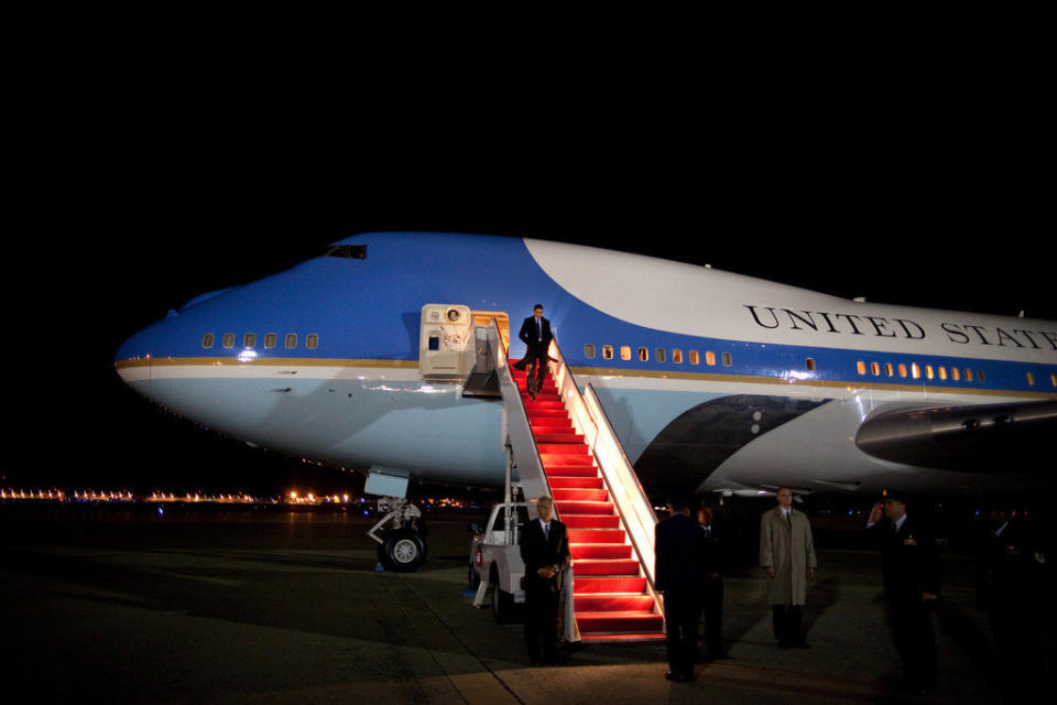 Obama makes his way down the stairs of Air Force One on April 8, 2009, upon his arrival to Andrews Air Force Base returning from Baghdad, Iraq.