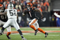 Cincinnati Bengals' Ja'Marr Chase (1) runs during the second half of an NFL wild-card playoff football game against the Las Vegas Raiders, Saturday, Jan. 15, 2022, in Cincinnati. (AP Photo/AJ Mast)