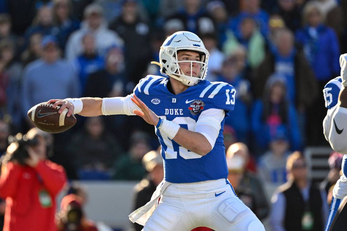 Duke quarterback Riley Leonard (13) passes the ball during the first half of the Military Bowl NCAA college football game against UCF, Wednesday, Dec. 28, 2022, in Annapolis, Md. (AP Photo/Terrance Williams)