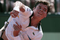 Canada's Milos Raonic serves to Argentina's Juan Monaco during their Men's Singles 3rd Round tennis match of the French Open tennis tournament at the Roland Garros stadium, on June 2, 2012 in Paris. AFP PHOTO / JACQUES DEMARTHONJACQUES DEMARTHON/AFP/GettyImages