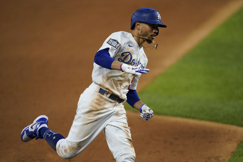 Mookie Betts helped the Dodgers win Game 1 at the plate and on the basepaths. (Photo by Cooper Neill/MLB Photos via Getty Images)