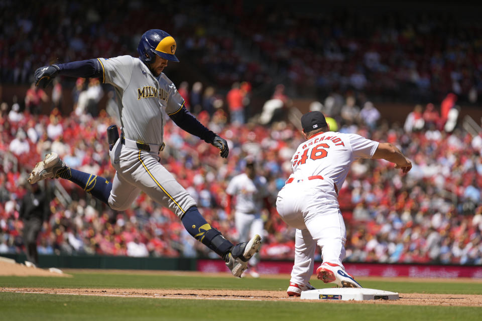 Milwaukee Brewers' Blake Perkins, left, grounds out to end the top of the fourth inning as St. Louis Cardinals first baseman Paul Goldschmidt (46) handles the throw during a baseball game Sunday, April 21, 2024, in St. Louis. (AP Photo/Jeff Roberson)