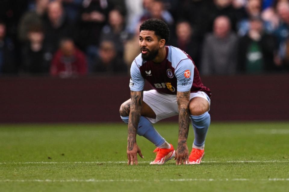 Aston Villa's Brazilian midfielder #06 Douglas Luiz reacts during the English Premier League football match between Aston Villa and Brentford at Villa Park in Birmingham, central England on April 6, 2024. (Photo by OLI SCARFF/AFP via Getty Images)