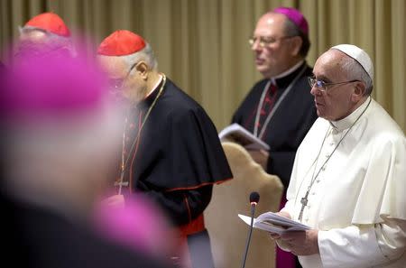 Pope Francis looks on as he leads the synod of bishops in Paul VI's hall at the Vatican October 6, 2014. REUTERS/Claudio Peri