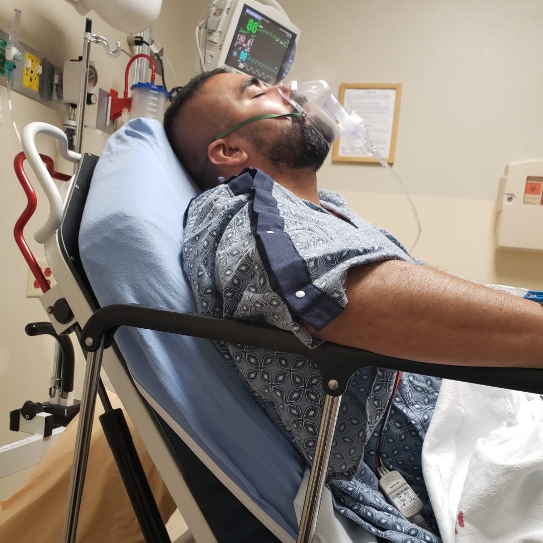 Jose Leon in the hospital with breathing support