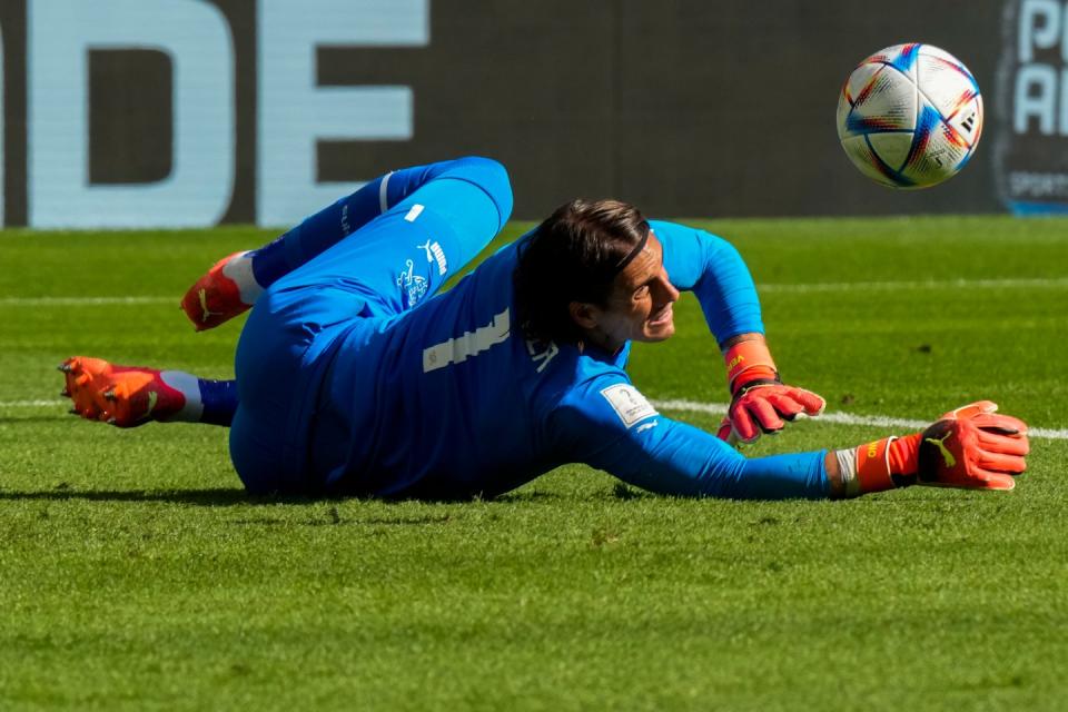 Switzerland's goalkeeper Yann Sommer makes a save during the World Cup group G football match between Switzerland and Cameroon, at the Al Janoub Stadium in Al Wakrah, Qatar, Thursday, Nov. 24, 2022. (AP Photo/Luca Bruno)