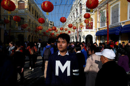 Suspended lawmaker Sulu Sou poses on a street in Macau, China February 13, 2018. REUTERS/Staff