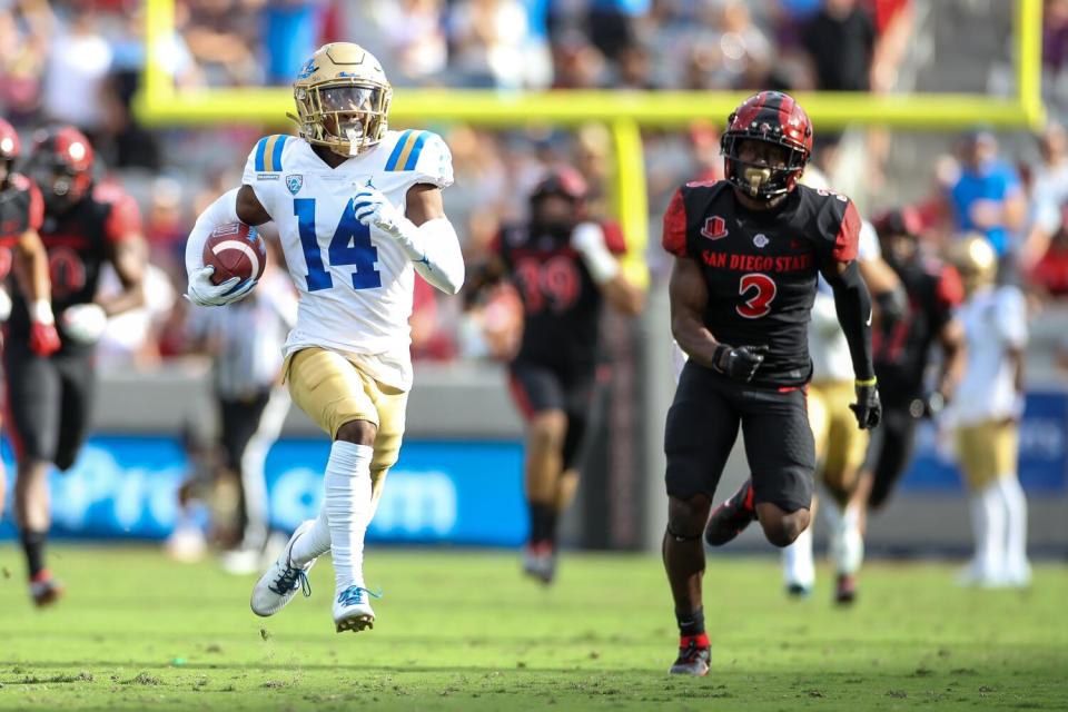 UCLA wide receiver Josiah Norwood scores on an 81-yard touchdown pass in the first quarter against San Diego State.
