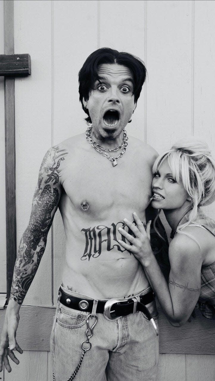 A black-and-white image of Sebastian Stan as Tommy Lee and Lily James as Pamela Anderson on "Pam & Tommy."