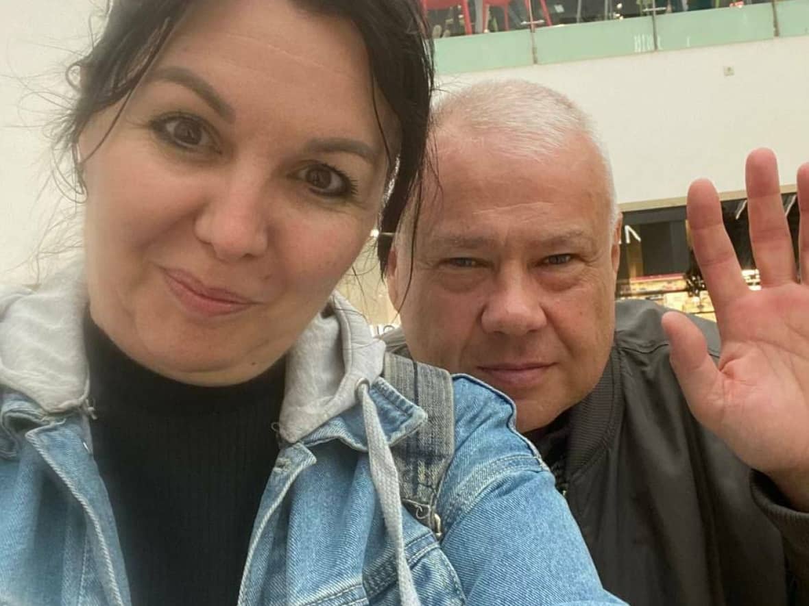 Oksana Korolova and Leonid Korolev are Ukrainian citizens with Canadian visas who were supposed to come to Canada on an Air Transat flight from Athens to Toronto on Monday, but instead were kicked off the flight by airline agents. (Submitted by Sanja Dommeier - image credit)