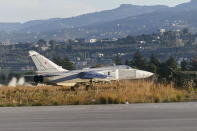 A Sukhoi Su-24 fighter jet taxis on tarmac at the Hmeymim air base near Latakia, Syria, in this file handout photograph released by Russia's Defence Ministry November 11, 2015. REUTERS/Ministry of Defence of the Russian Federation/Handout via Reuters/Files